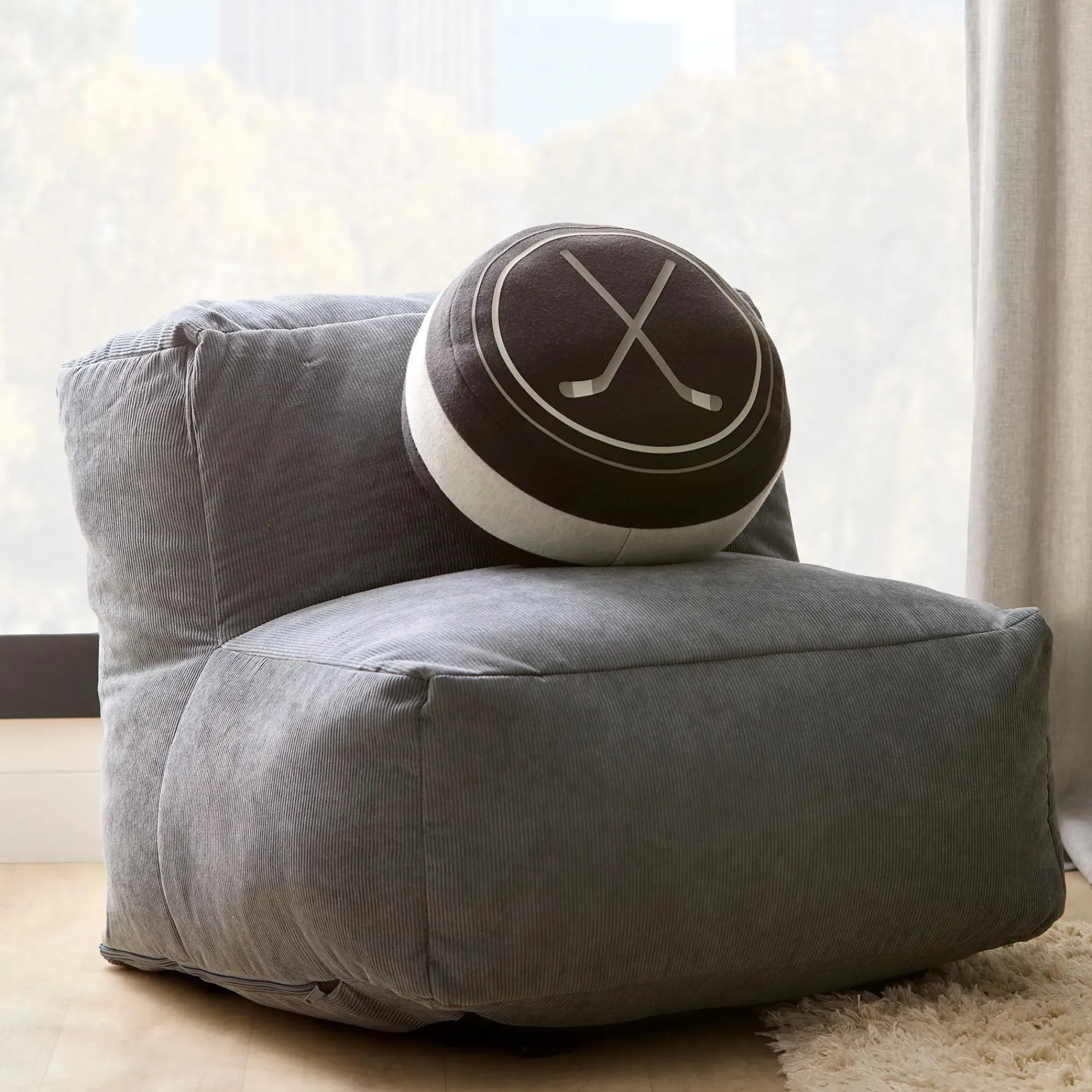 Best Bouclair Shaped Cushion with Hockey Sticks